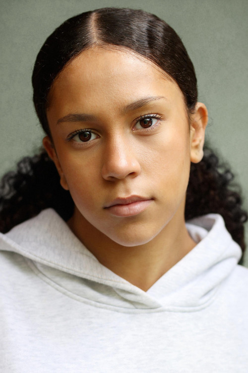 Romanie Jija-Wakeham as Iris