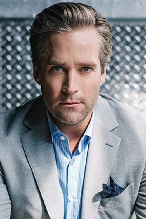 Tyler Hollinger as Police Officer Baker