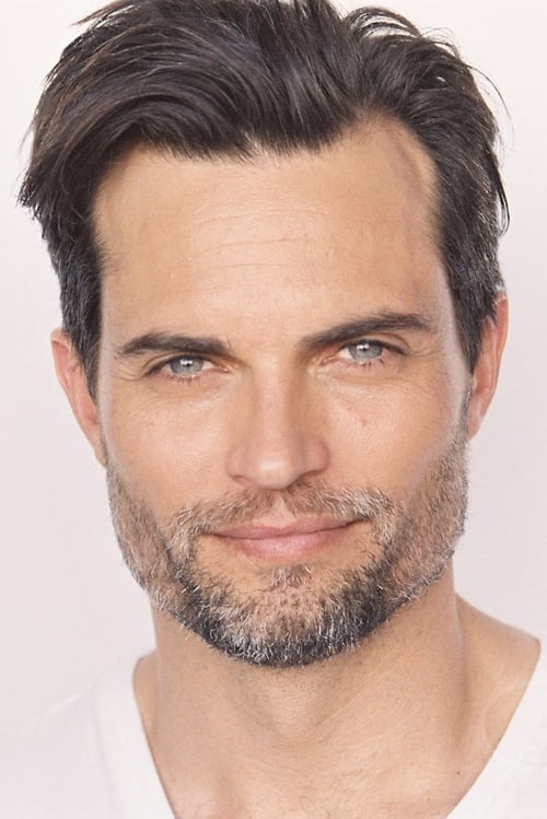 Scott Elrod as Eric
