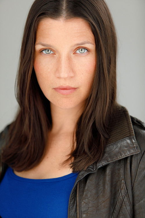 Freya Saxon as News Reporter