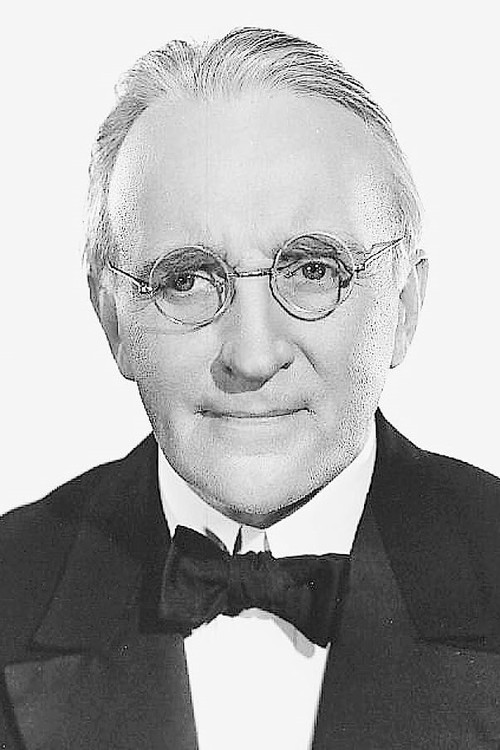 Wyndham Standing as Max's Butler