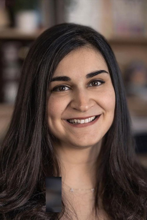 Mitra Shahidi as Office Lady #2 (voice)