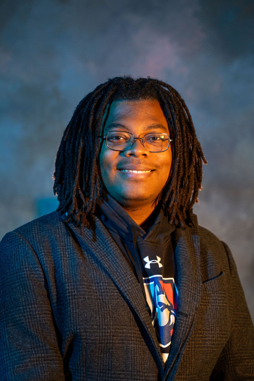 Moses Johnson as Mechanic