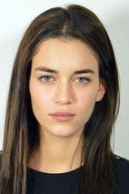 Sonia Nini as Sandra, delivery girl