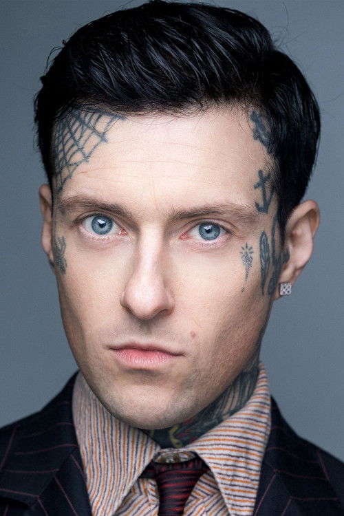 Brandy Row as Tattoo parlor owner