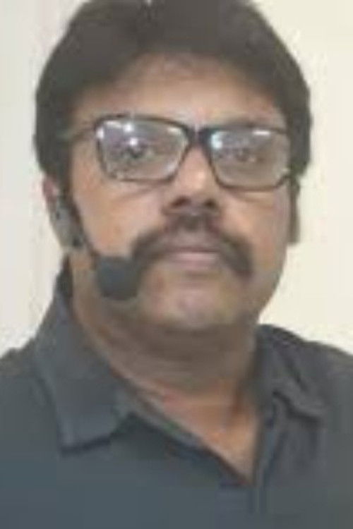 Kp Logathas as Ravi, le père