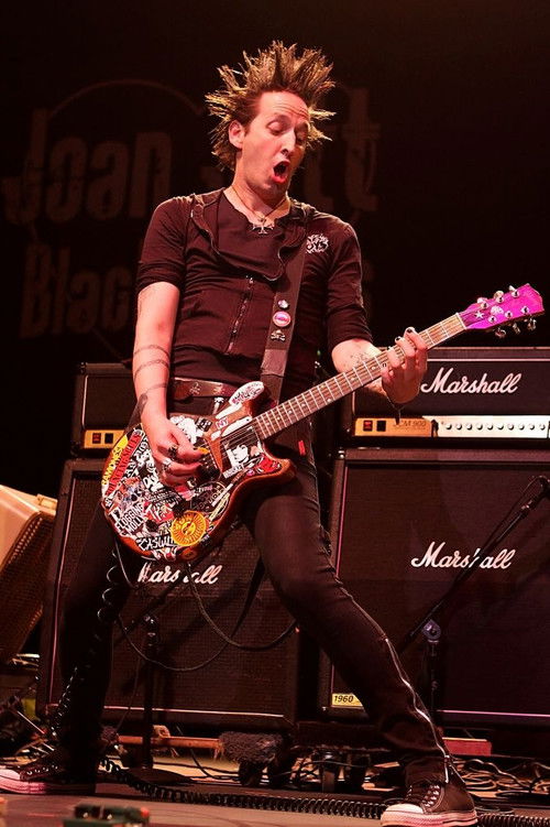 Dougie Needles as Self - Lead Guitar, Backing Vocals