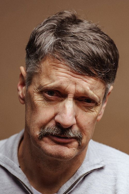 Joe Mullins as Clockmaker