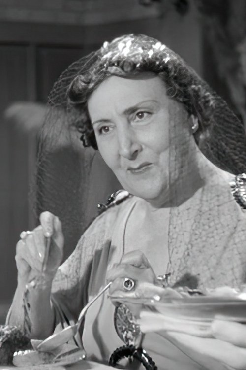 Alys Delonde as Henriette Corniche, femme d'Adrien