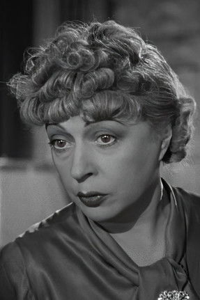 Suzanne Dantès as Mrs. Delacroix