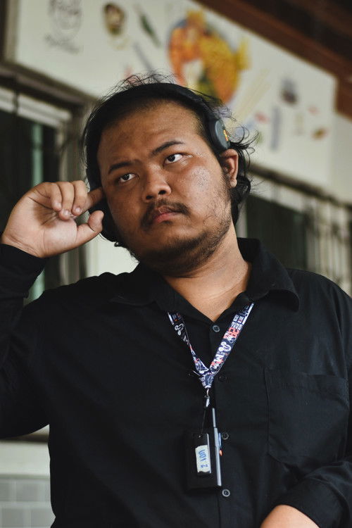 Akemunin Chantasirirat as Director from Darkweb (V.O.)