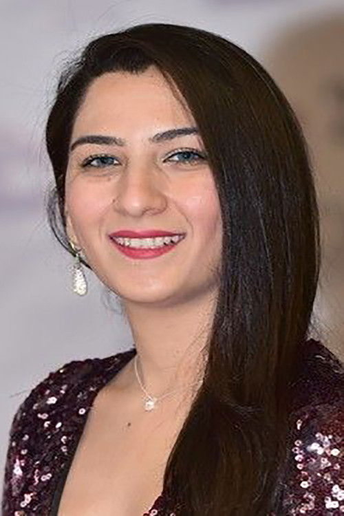 Emma Shah as 