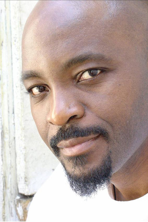 Emile Abossolo M'bo as Le chef de quartier