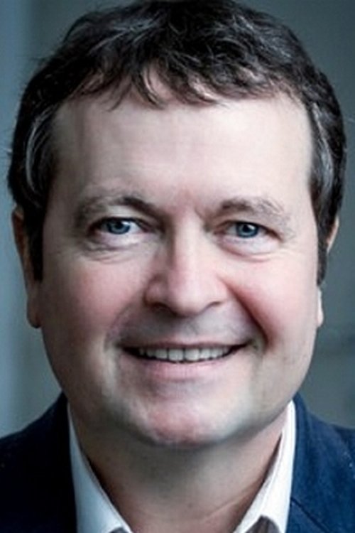 Alain Guillo as TV presenter