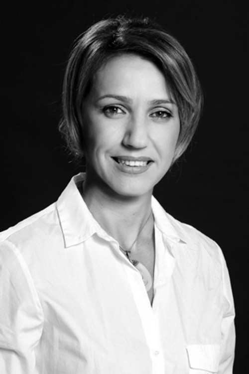 Aurita Agushi as Merita Pirulli