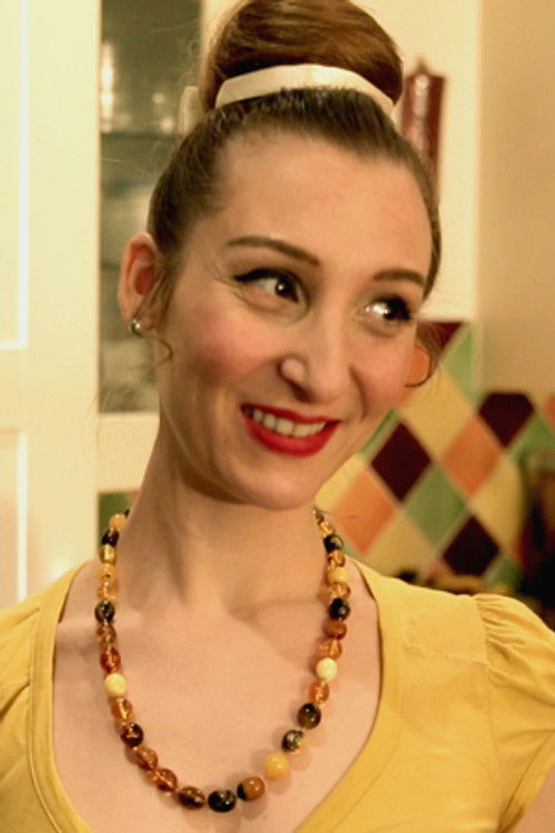 Angelique Vergara as Anita (Lady Cupcake)