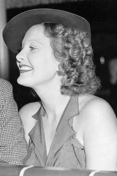 Norma Taylor as Blonde Casino Patron