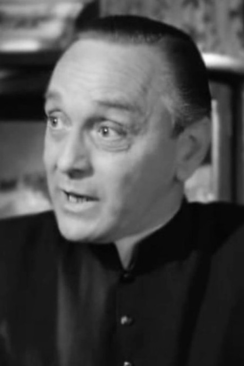 Charles Andre as Father Dominique