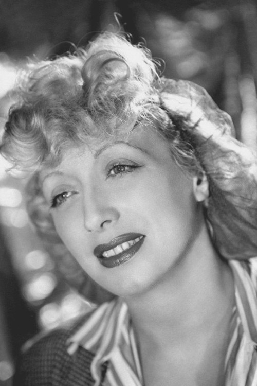 Suzy Prim as Mrs. Olga, pawnbroker