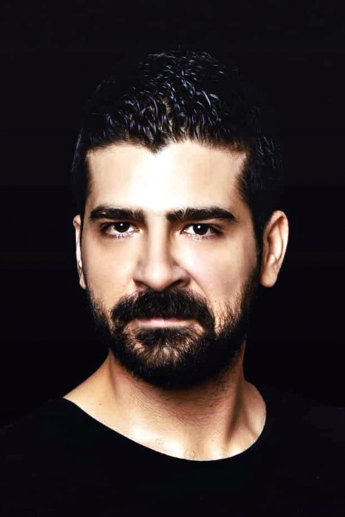 Arsal Mazmanoğlu as Sezai Karakoç (Young)