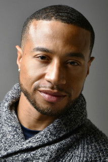 Kalon Jackson as Financial Advisor Keith