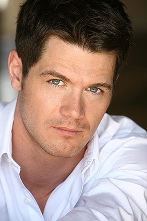 Tim Hammer as Roland Davis