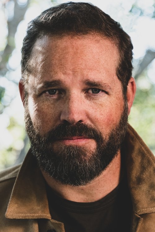 David Denman as Greg