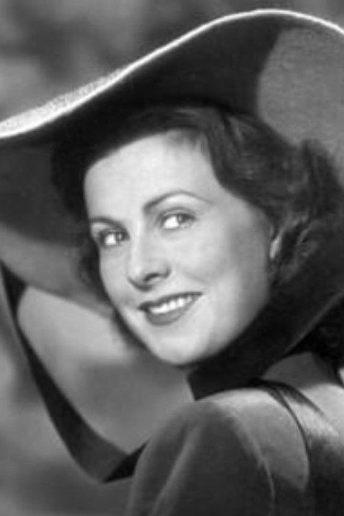 Dora Komar as Emmi Krall, Jauners Ehefrau