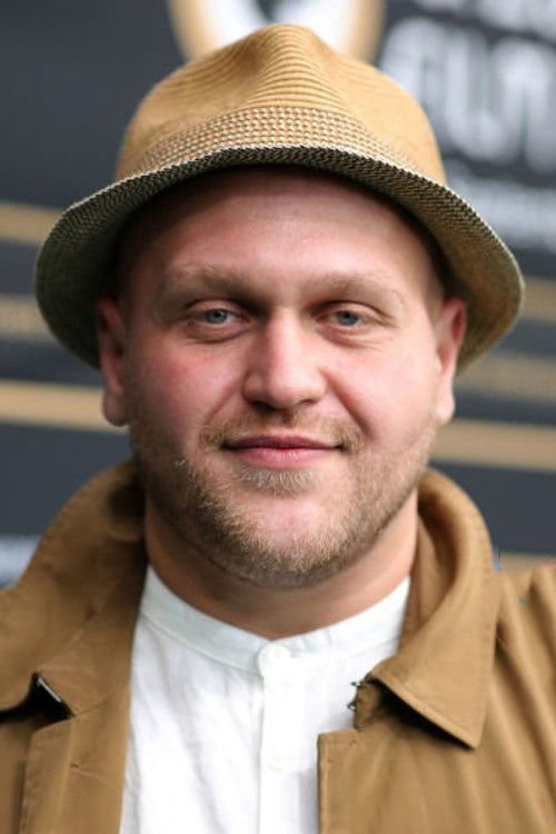 Dardan Sadik as Milan Gjokaj