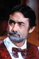 Luis Delgado as The Hatman (loses hat to Costain)