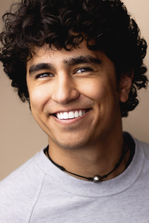 Logan Squire as Helper Elf