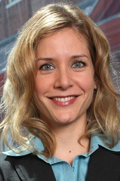 Erin Borgfjord as TV News Anchor