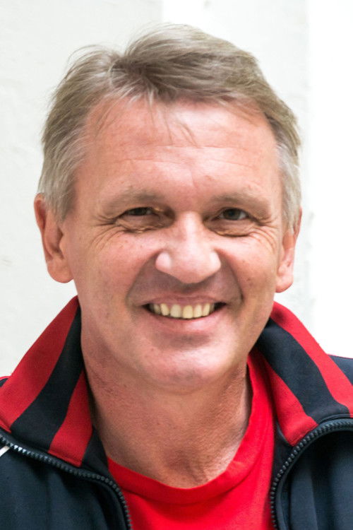 Zbigniew Czendlik as farář Křížek