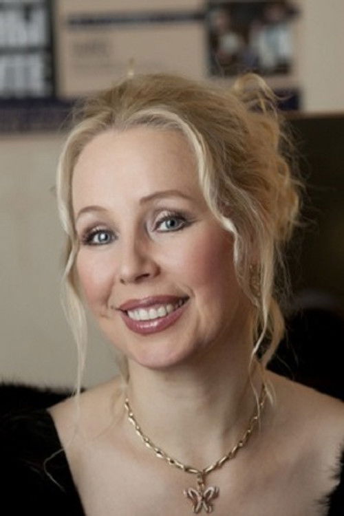 Regina Lialeikite as Ольга, политически подкованная ученица