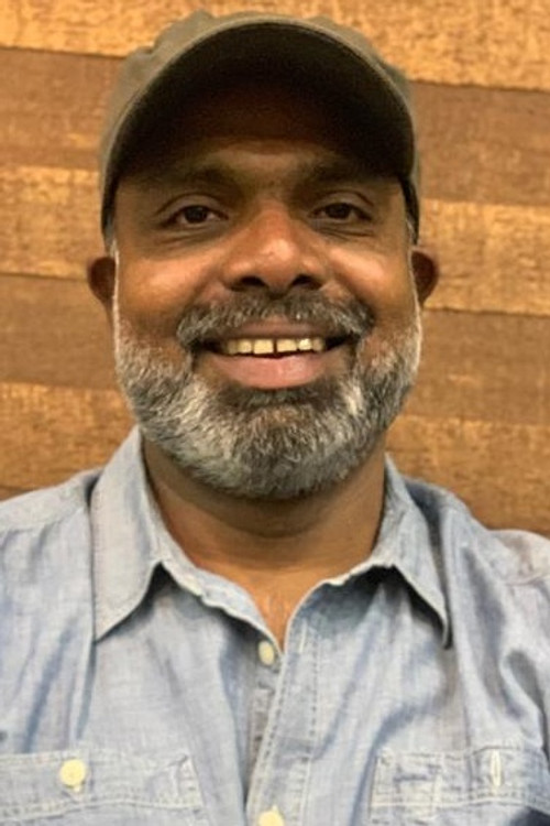 Chemban Vinod Jose as Prof. N. Neelakandan