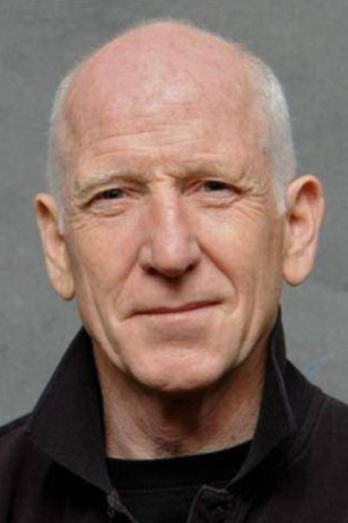 Dennis Coard as Hogan