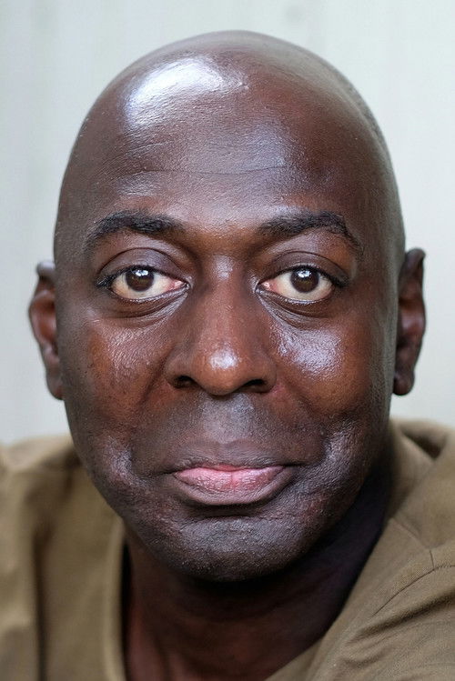 Clive Llewellyn as Postman