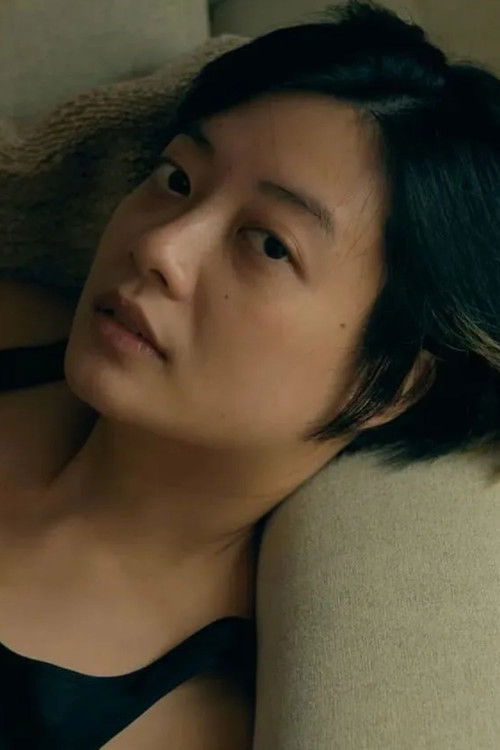 Leony Vitria Hartanti as Hadi's Wife