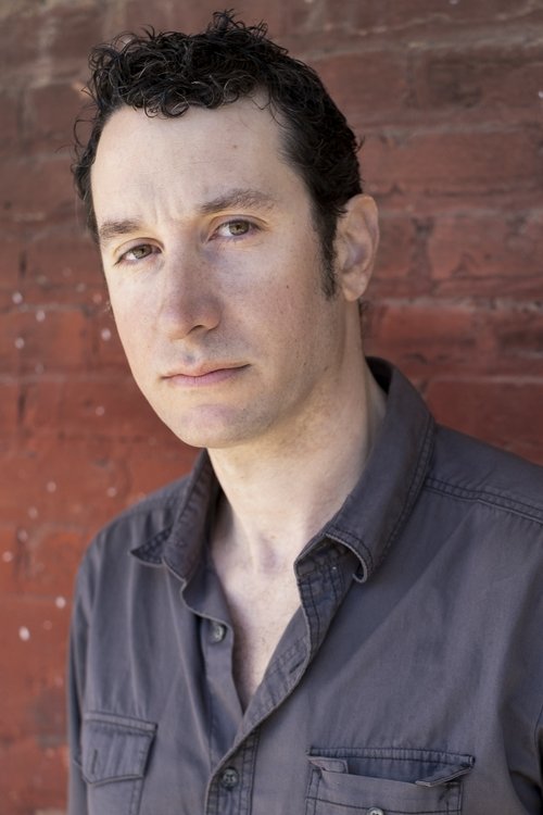 Michael Hogan as Kenny