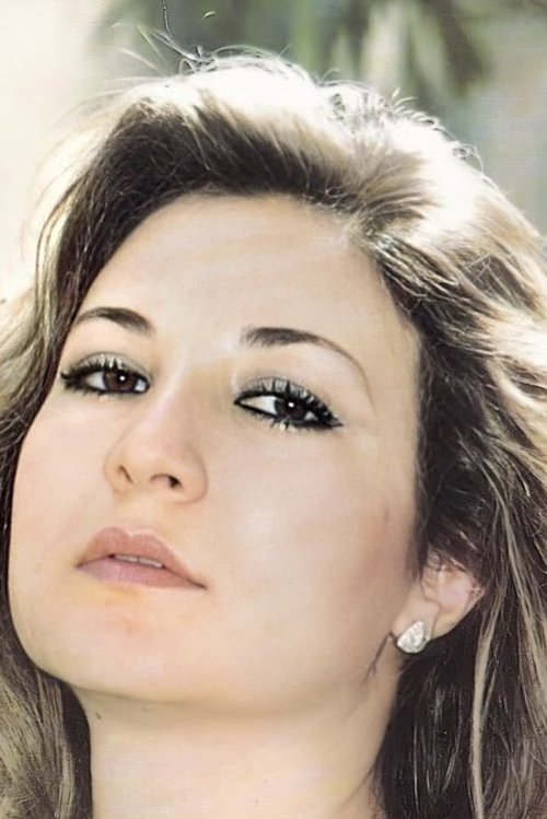 Jala Fahmi as The TV Presenter