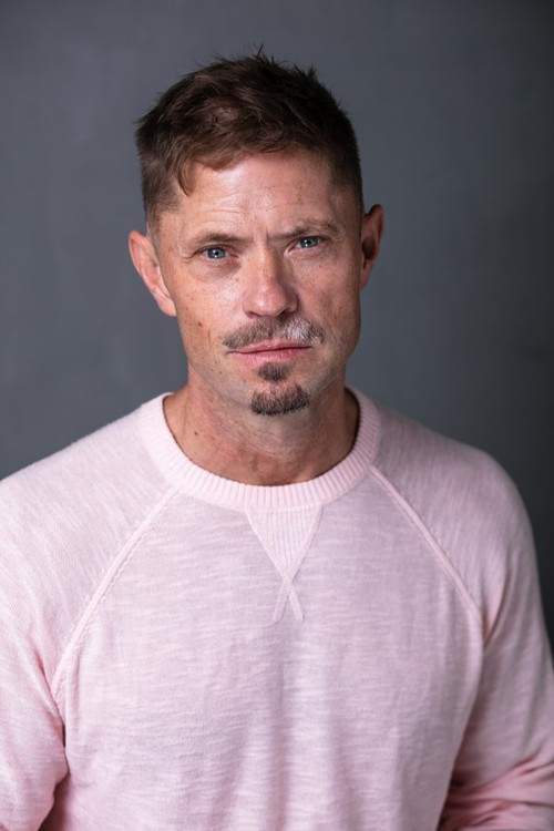 Reginald Ammons as Earl Cooper