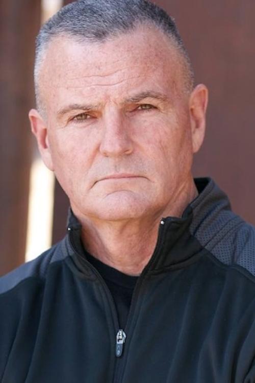 Steve Mokate as Commander Johns