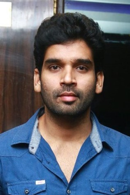 Suresh Ravi as Dev