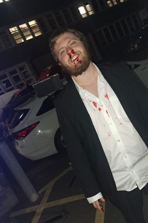 Luke Rhys Petersen as The Auditor