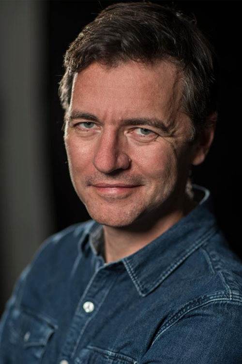 Oliver Zahle as Benny