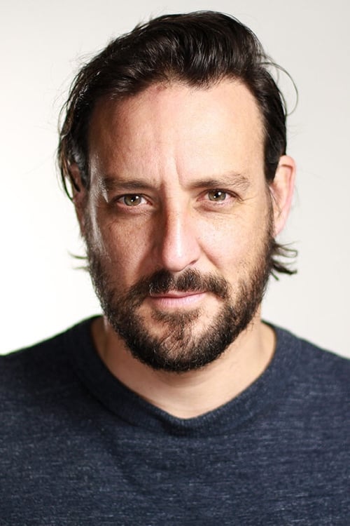 Brett Williams as Burt Rogan