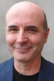 Richard Attlee as Carey