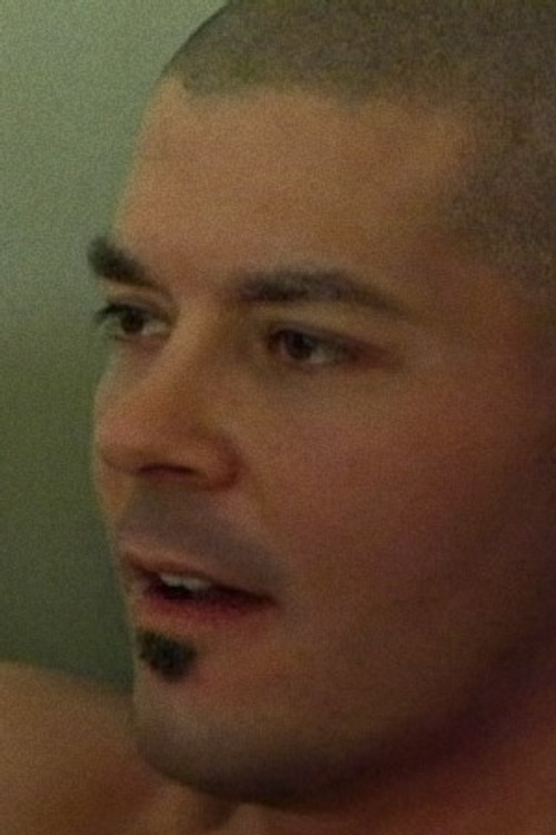 Toby James as (archive footage)