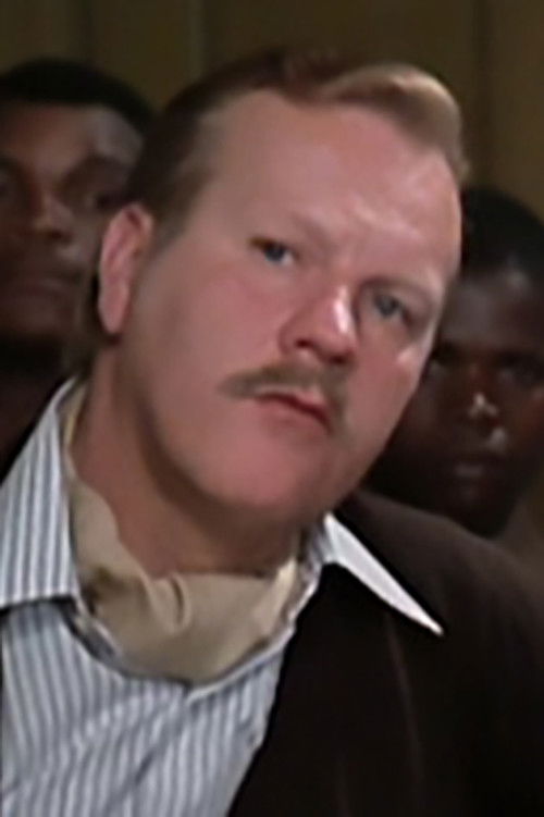 Derek Mills as Man in Court (uncredited)