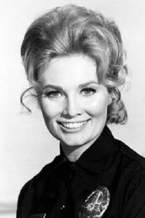 Beth Brickell as Katie Barrett